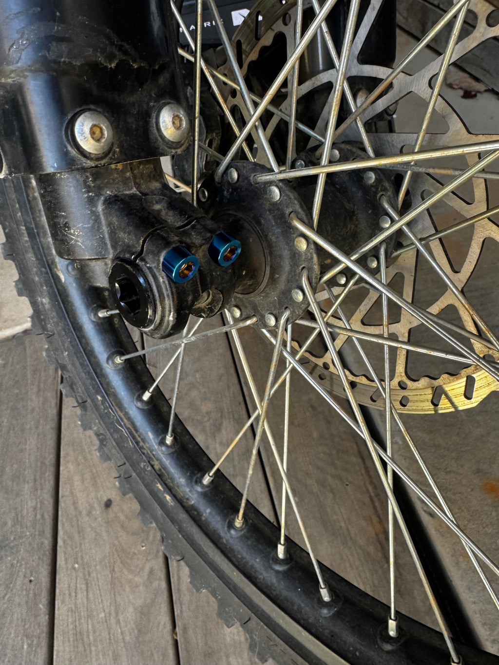 Titanium Talaria front axel pinch bolts